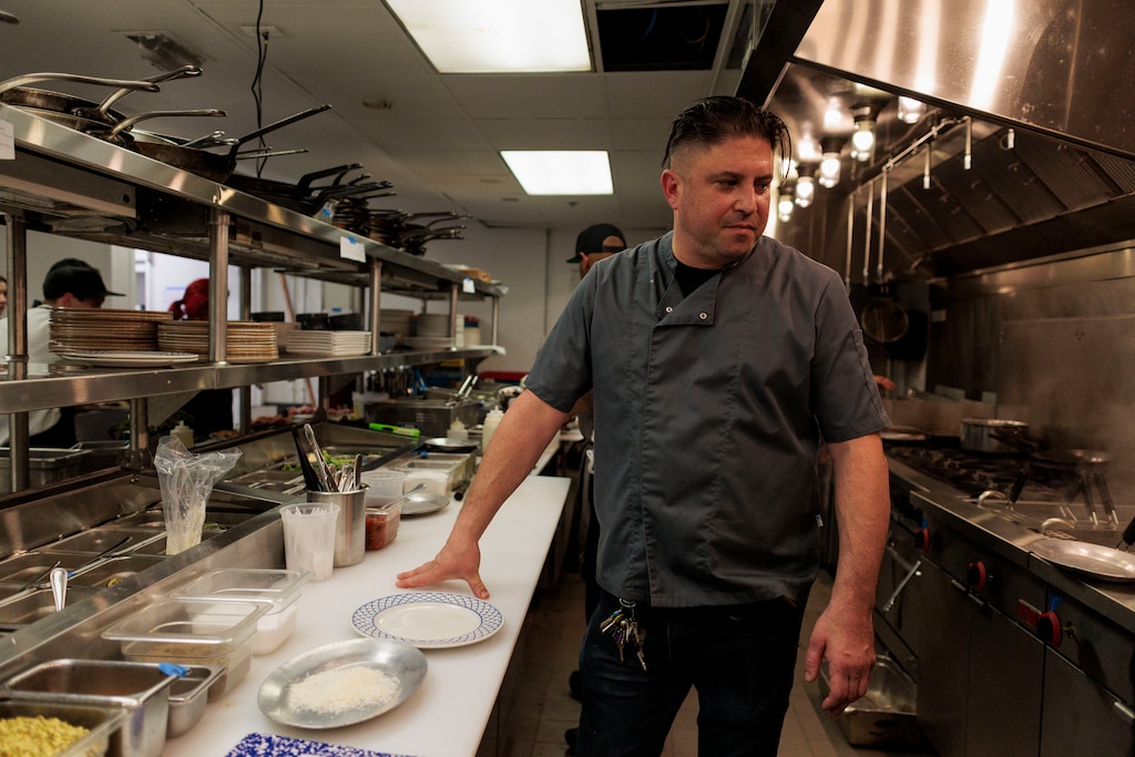 Ben Lefenfeld, co-owner of Seppia, works in the kitchen during the soft opening.