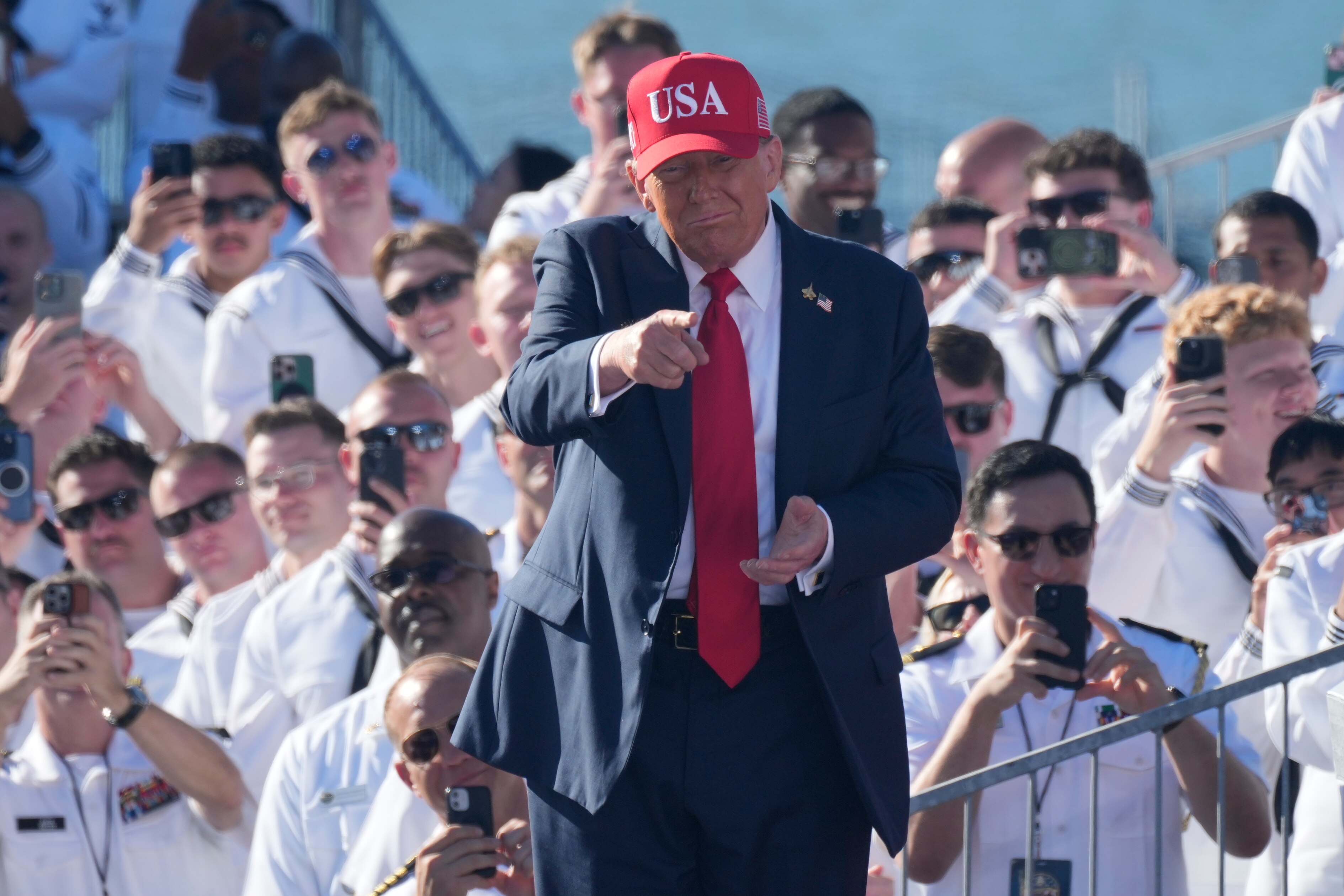 President Donald Trump arrives to speak during a celebration for the 250th anniversary of the U.S. Navy aboard the USS Harry S. Truman at Naval Station Norfolk, Sunday Oct. 5, 2025 in Norfolk, Va.