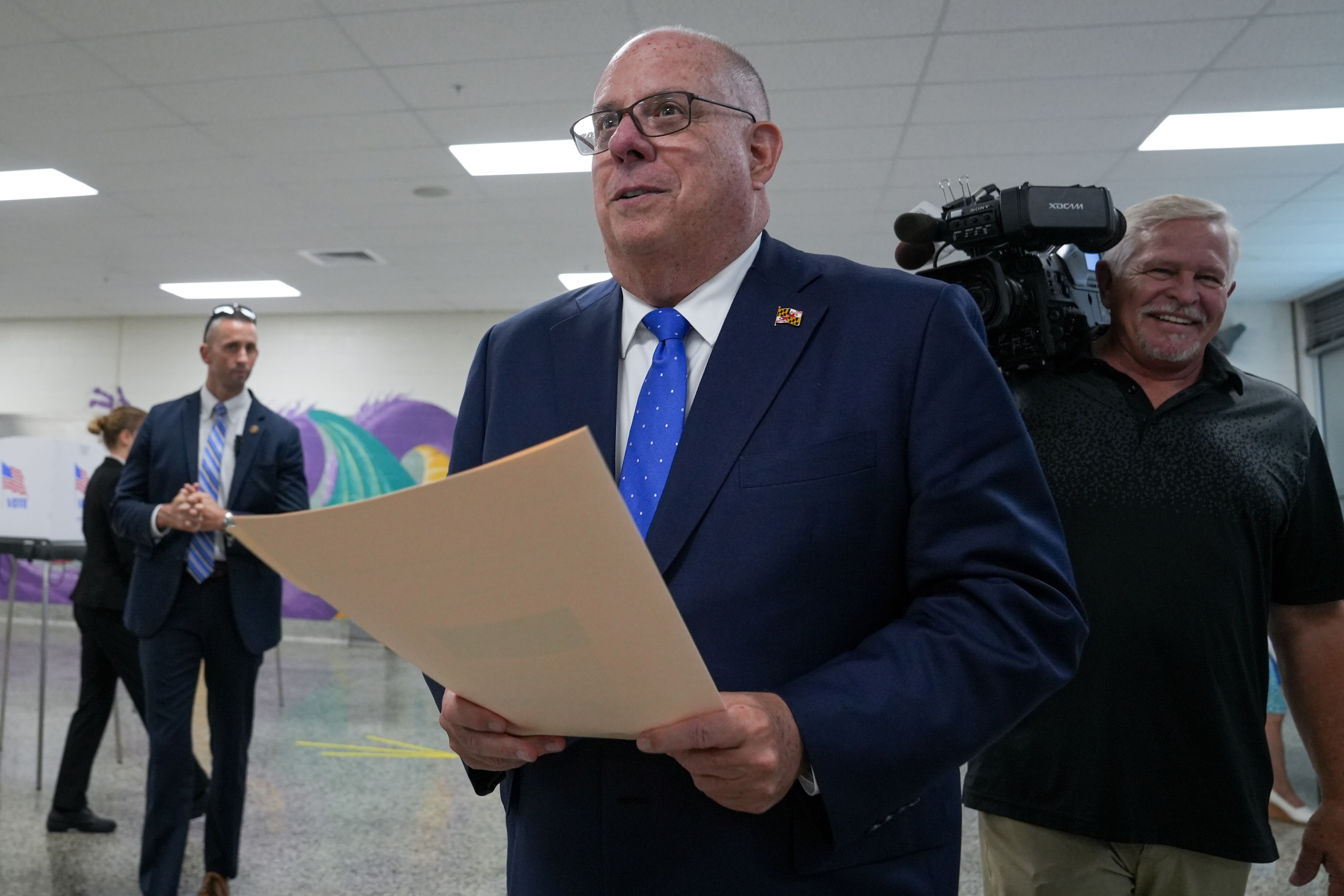 7/7/22—Gov. Larry Hogan gets ready to vote inside Annapolis Middle School on the first day of early voting in Maryland’s Primary Election.