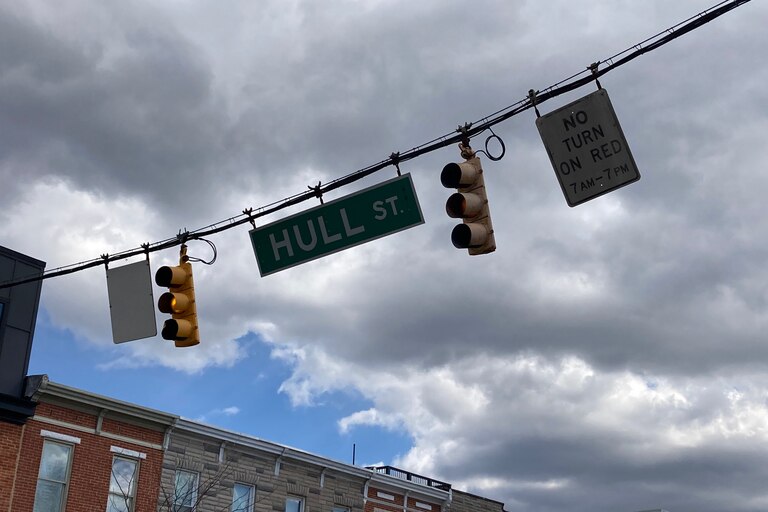 Traffic signals at East Fort Avenue and Hull Street in South Baltimore sway in the wind on Sunday, March 10, 2024.