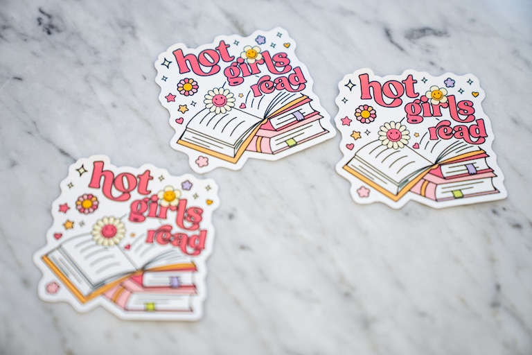 Merchandise branded with "Hot Girls Read."
