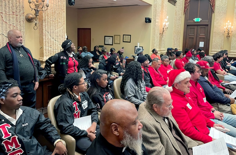 THURSDAY, DECEMBER 18, 2025 - Supporters of the Baltimore Children and Youth Fund, many wearing red, pack Baltimore City Council chambers Thursday to testify against legislation that would place new restrictions on the fund.