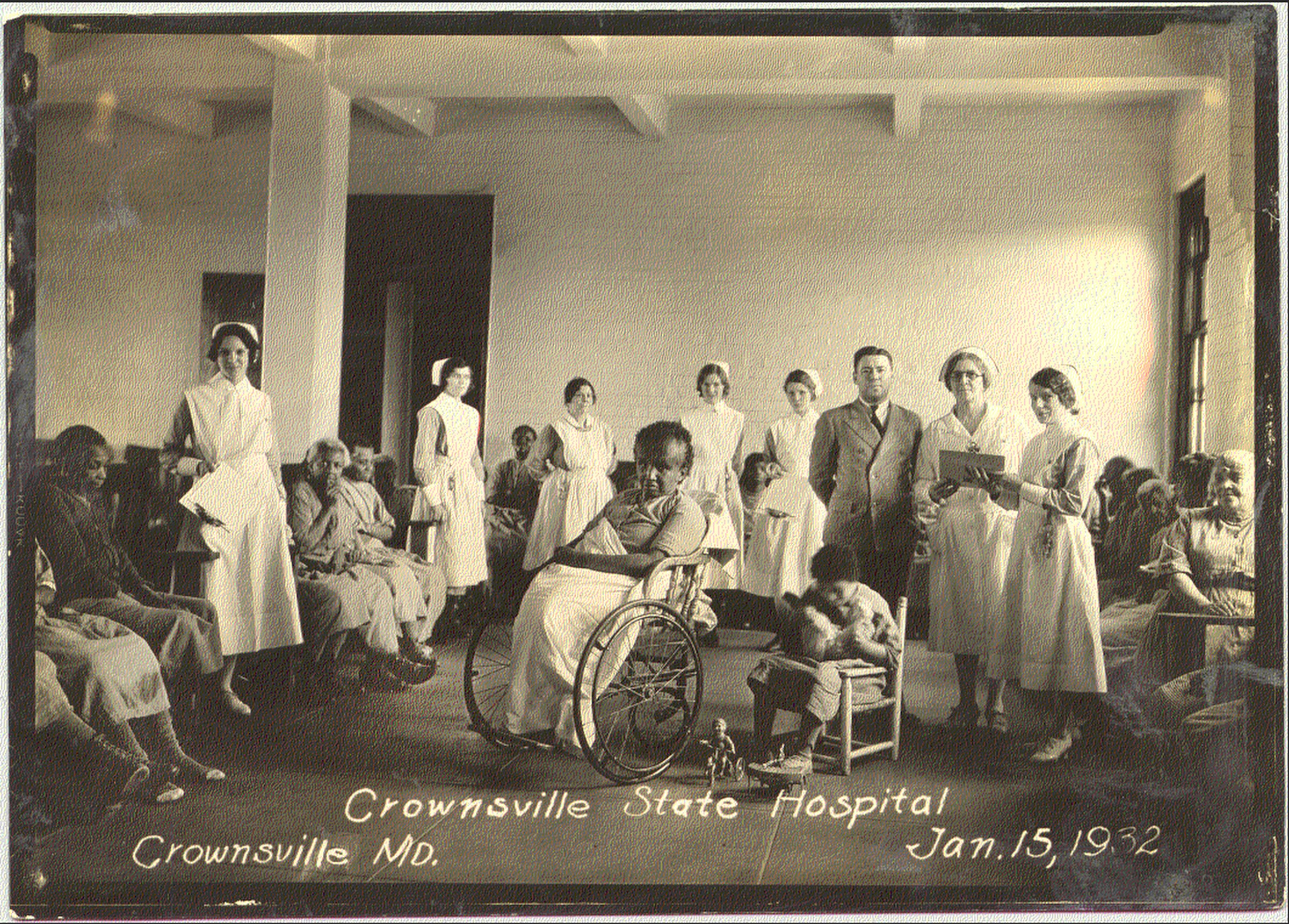 Crownsville State Hospital in Crownsville, Maryland. The photo, dated Jan. 15, 1932, pictures patients, nurses and the doctor.