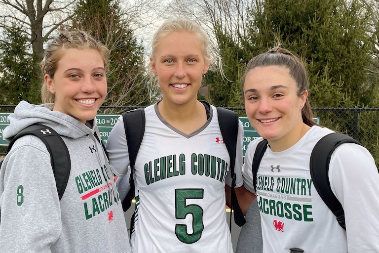 Attacker Regan Byrne (left) scored seven goals while defender Ashley Dyer (5) and goalie Natalie Eastwood led a stellar defensive effort in Glenelg Country School’s 15-5 lacrosse win over Notre Dame Prep Tuesday. Eastwood, a first-year starter, made a few spectacular saves to set the tone early as the Dragons rolled to a 6-0 lead, including three goals from Byrne.