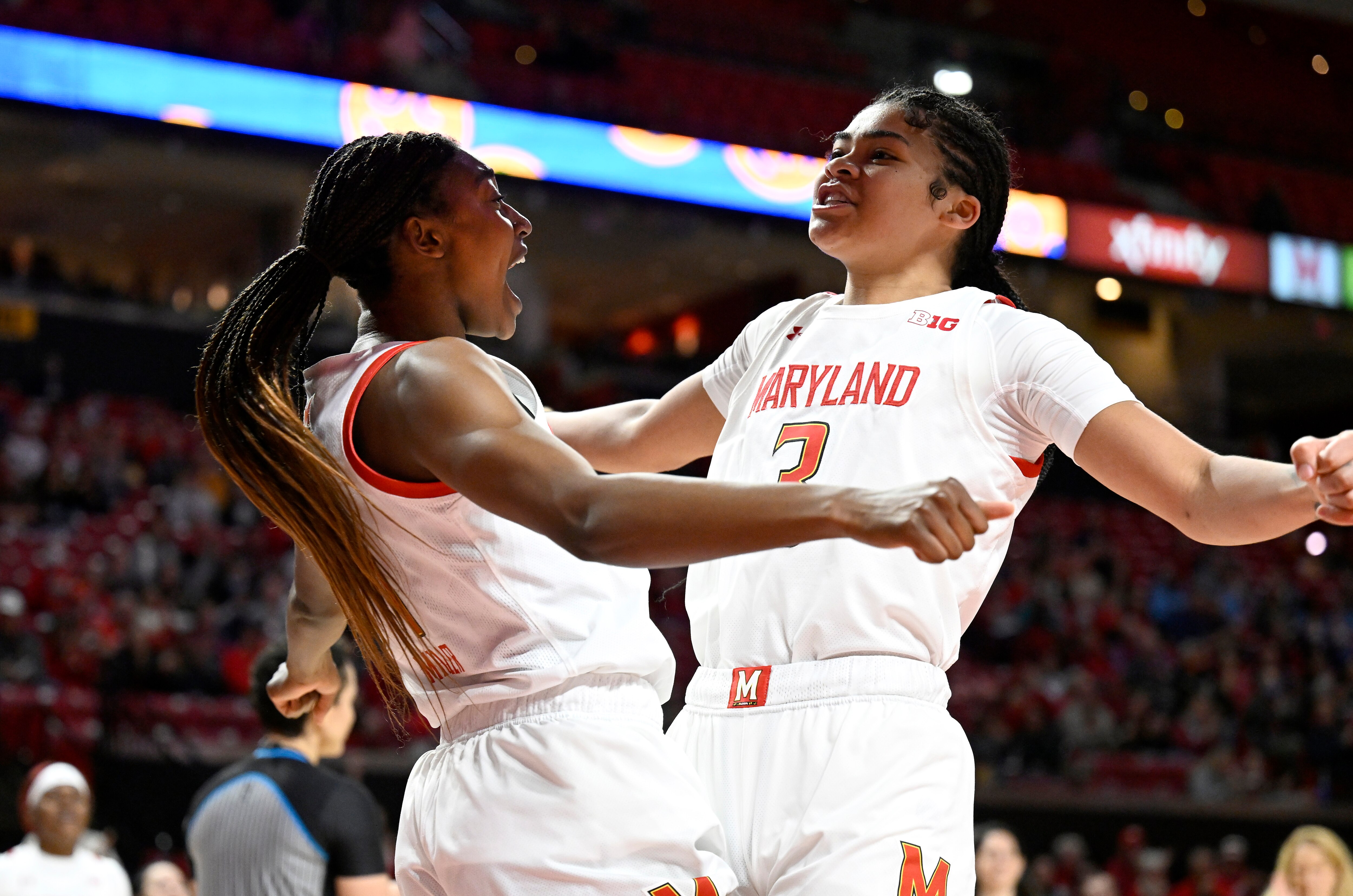 COLLEGE PARK, MARYLAND - JANUARY 07: Diamond Miller #1 of the Maryland Terrapins celebrates with Lavender Briggs #3 in the third quarter against the Michigan State Spartans at Xfinity Center on January 07, 2023 in College Park, Maryland. (Photo by Greg Fiume/Getty Images)