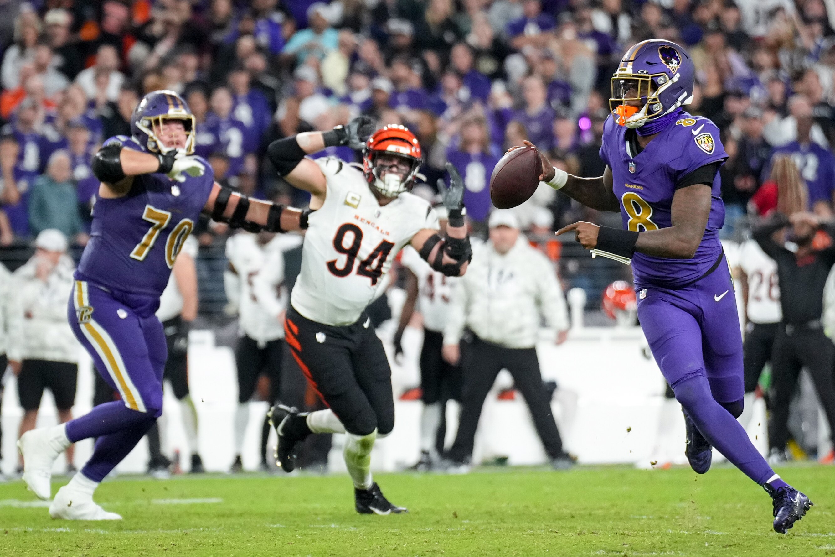 Baltimore Ravens quarterback Lamar Jackson (8) scrambles with the ball during a Thursday Night Football game against the Cincinnati Bengals at M&T Bank Stadium in Baltimore, Md., on November 7, 2024. The Baltimore Ravens won, 35-34.