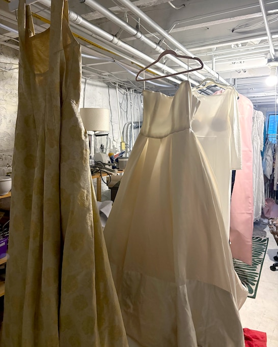 The wedding dresses Jill Andrews saved from her shop and stored in her basement after Monday's fire in Hampden.