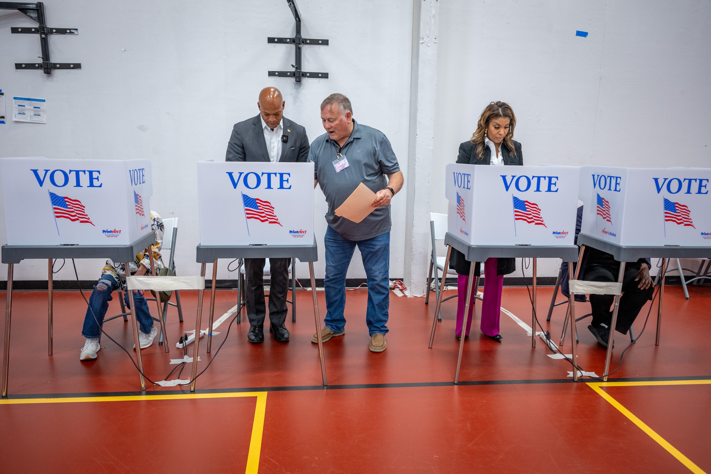 Gov. Wes Moore and first lady Dawn Moore cast ballots at the Pip Moyer Recreation Center in Annapolis during early voting on Friday. 