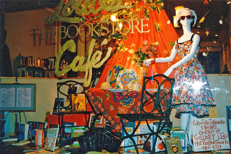 Thea Osato "cooing and entertaining" themed window design at Louies Bookstore Cafe.