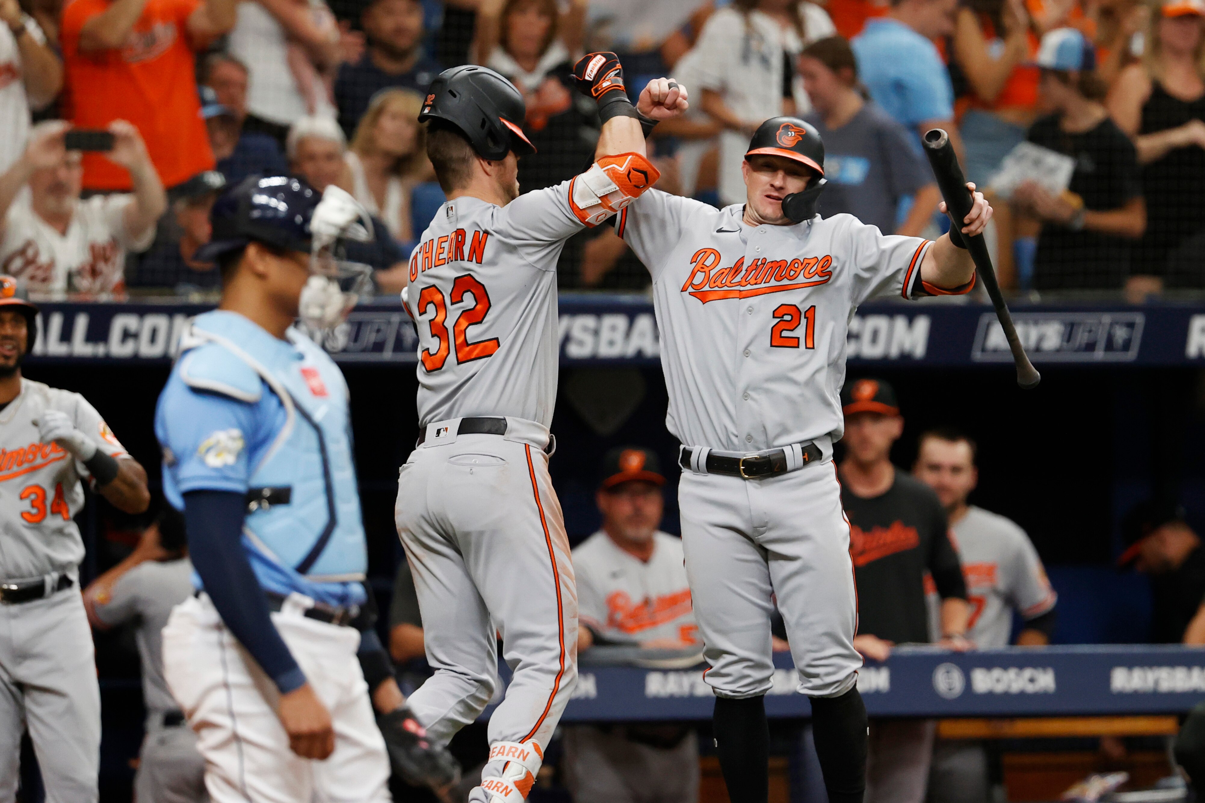 Orioles first baseman Ryan O'Hearn celebrates with teammate Austin Hays after hitting the go-ahead home run against the Rays on Sunday. They did it to plenty of cheers from the team's fans who traveled to see them play.