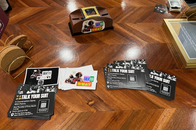 Cortnie Burriss hosts a game night every first Thursday of the month at Upper Marlboro’s Free State Distillery. Patrons play “Talk Your Suit,” a game Burriss originally created for her high school literature students and encourages players to use different conversation skills.