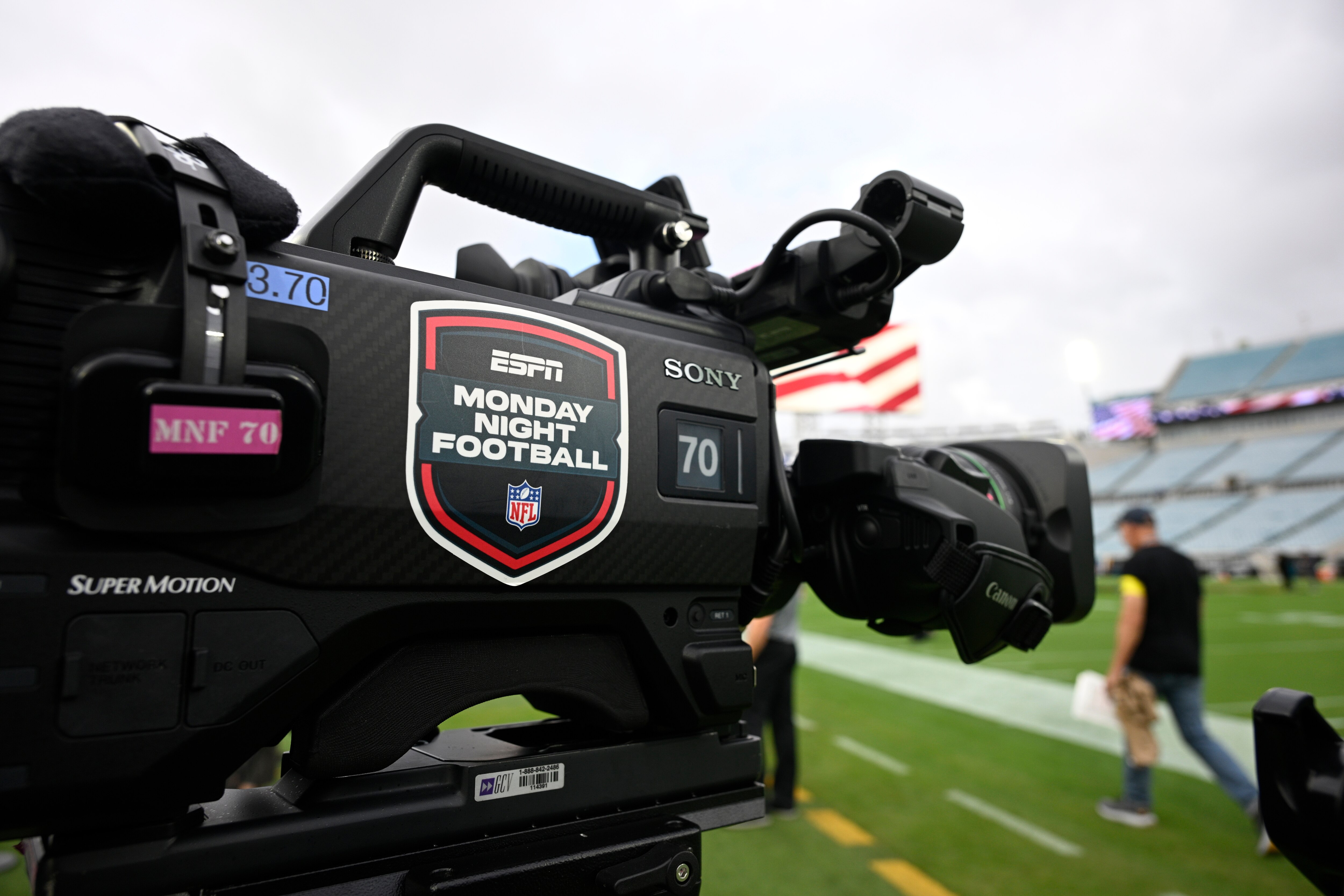 FILE - An ESPN Monday Night Football logo is viewed on a broadcast camera before an NFL football game between the Jacksonville Jaguars and the Kansas City Chiefs, Monday, Oct. 6, 2025, in Jacksonville, Fla. (AP Photo/Phelan M. Ebenhack, File)