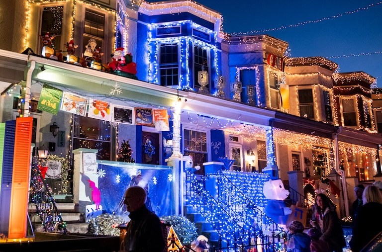 Homes are decorated in holiday lights at Hampden's Miracle on 34th Street annual display on Sunday, December 8, 2024.