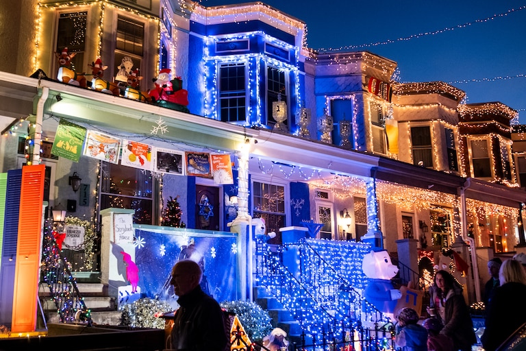 Homes are decorated in holiday lights at Hampden's Miracle on 34th Street annual display on Sunday, December 8, 2024.