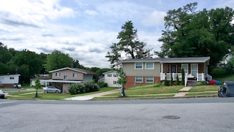 July 8, 2026 - Views of 6102 Talles Road where Baltimore County Police are investigating a double shooting that left two juveniles, ages 9 and 15, dead.