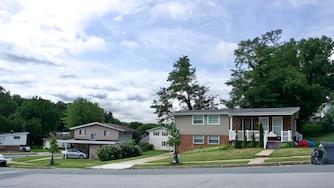 July 8, 2026 - Views of 6102 Talles Road where Baltimore County Police are investigating a double shooting that left two juveniles, ages 9 and 15, dead.