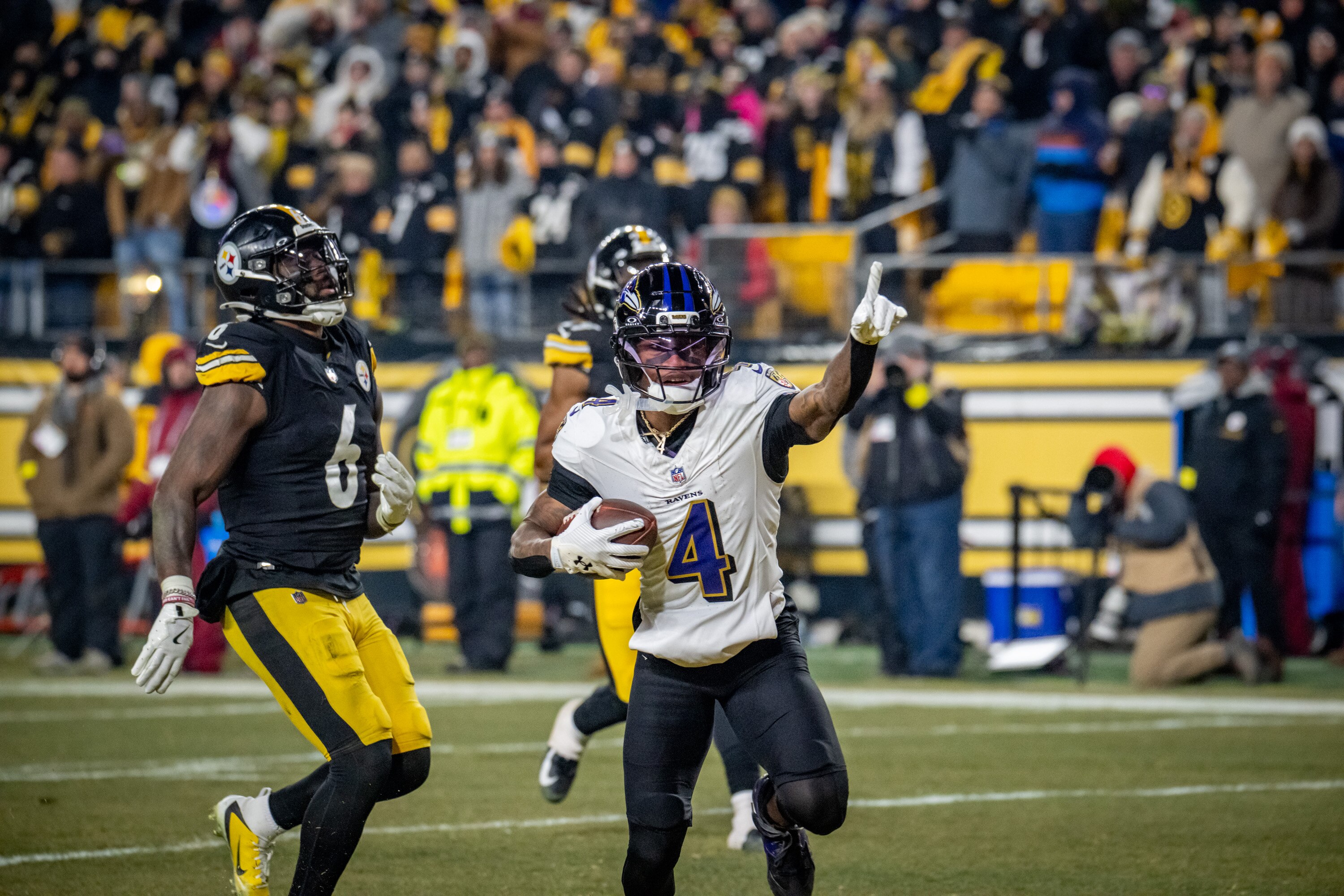 Ravens wide receiver Zay Flowers runs in the end zone for a touchdown in the team's Week 18 game against the Pittsburgh Steelers.
