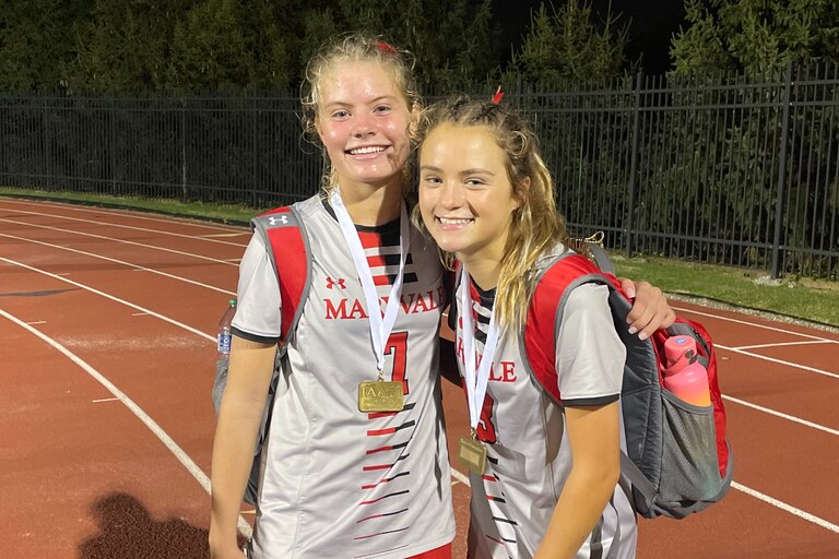 Avery Weetenkamp (left) and Laney Clements, both underclassmen, played major roles for Maryvale Prep soccer Saturday. The Lions won the IAAM B Conference championship with a 1-0 victory over Bryn Mawr at Calvert Hall.