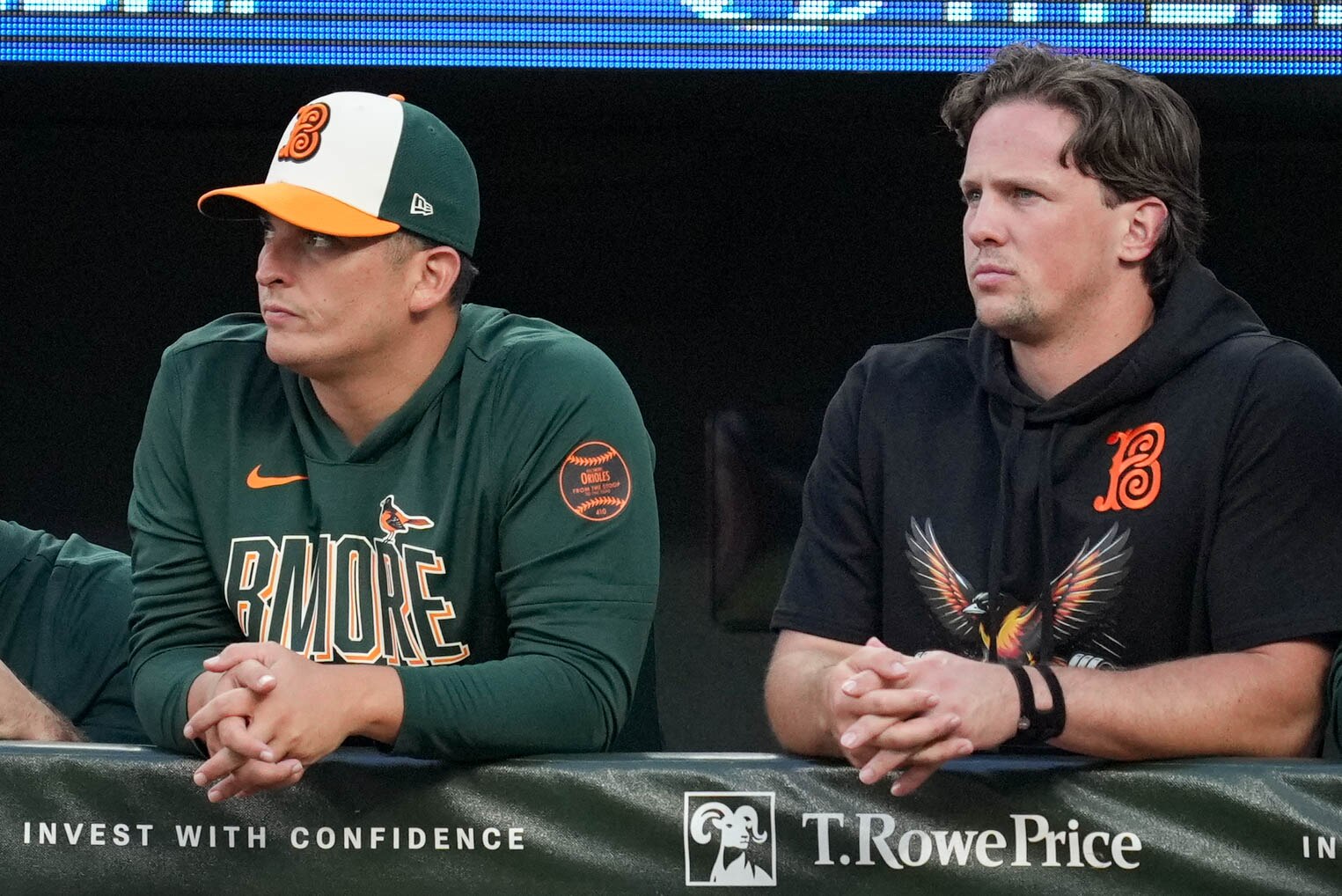 Adley Rutschman, right, and Orioles assistant hitting coach Brady North watch the first inning of Friday night’s game against the Phillies at Camden Yards.