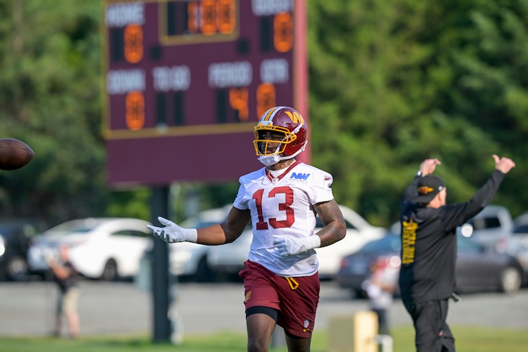 Washington Commanders wide receiver Treylon Burks works out the first day of training camp on July 29.