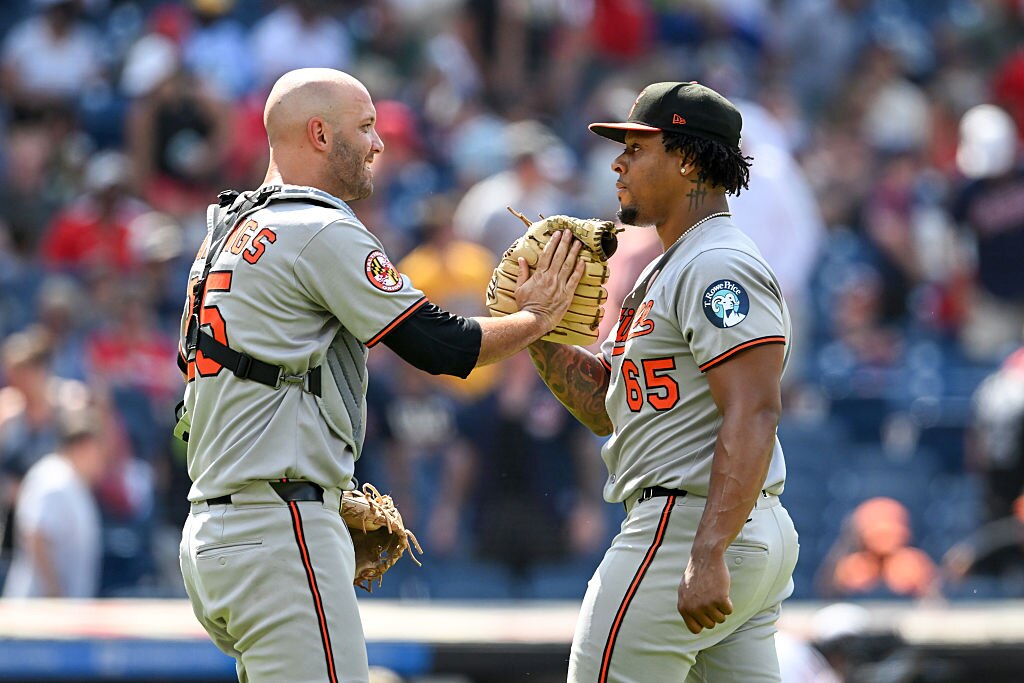 Catcher Jacob Stallings and reliever Gregory Soto celebrate the Orioles’ 4-3 win over the Cleveland Guardians on Thursday.
