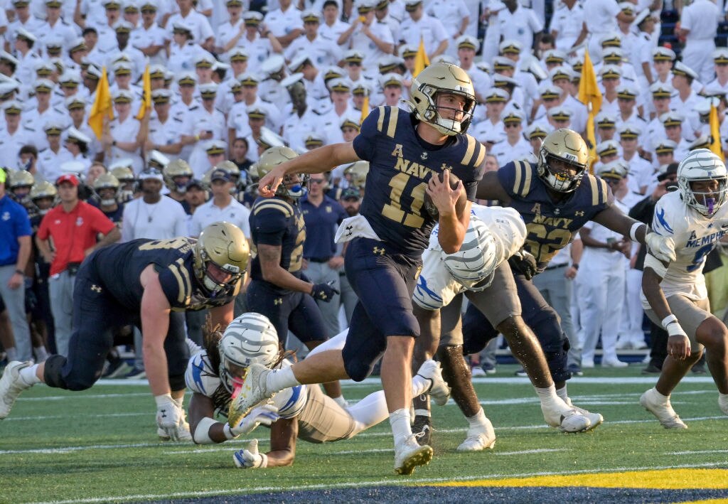ANNAPOLIS, MD - SEPTEMBER 21:  Navy Midshipmen quarterback Blake Horvath (11) runs towards the end zone for a touchdown during the Memphis Tigers game versus the Naval Academy Midshipmen on September 21, 2024 at Navy - Marine Corps Memorial Stadium in Annapolis, MD.