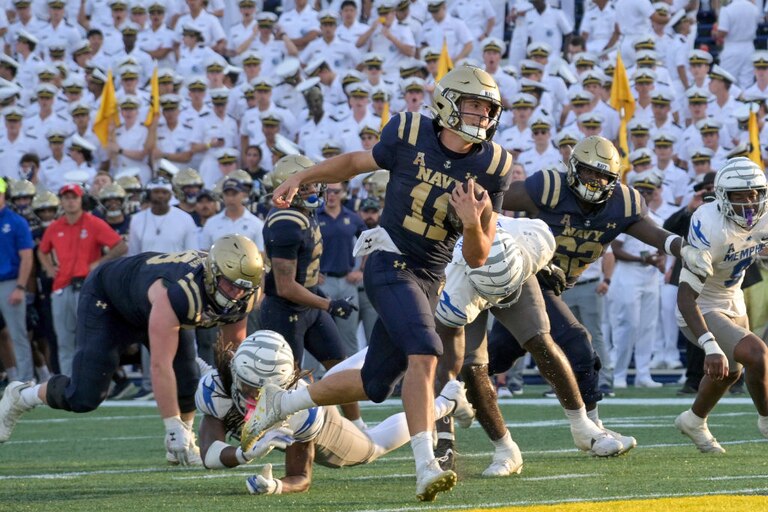 ANNAPOLIS, MD - SEPTEMBER 21: Navy Midshipmen quarterback Blake Horvath (11) runs towards the end zone for a touchdown during the Memphis Tigers game versus the Naval Academy Midshipmen on September 21, 2024 at Navy - Marine Corps Memorial Stadium in Annapolis, MD.