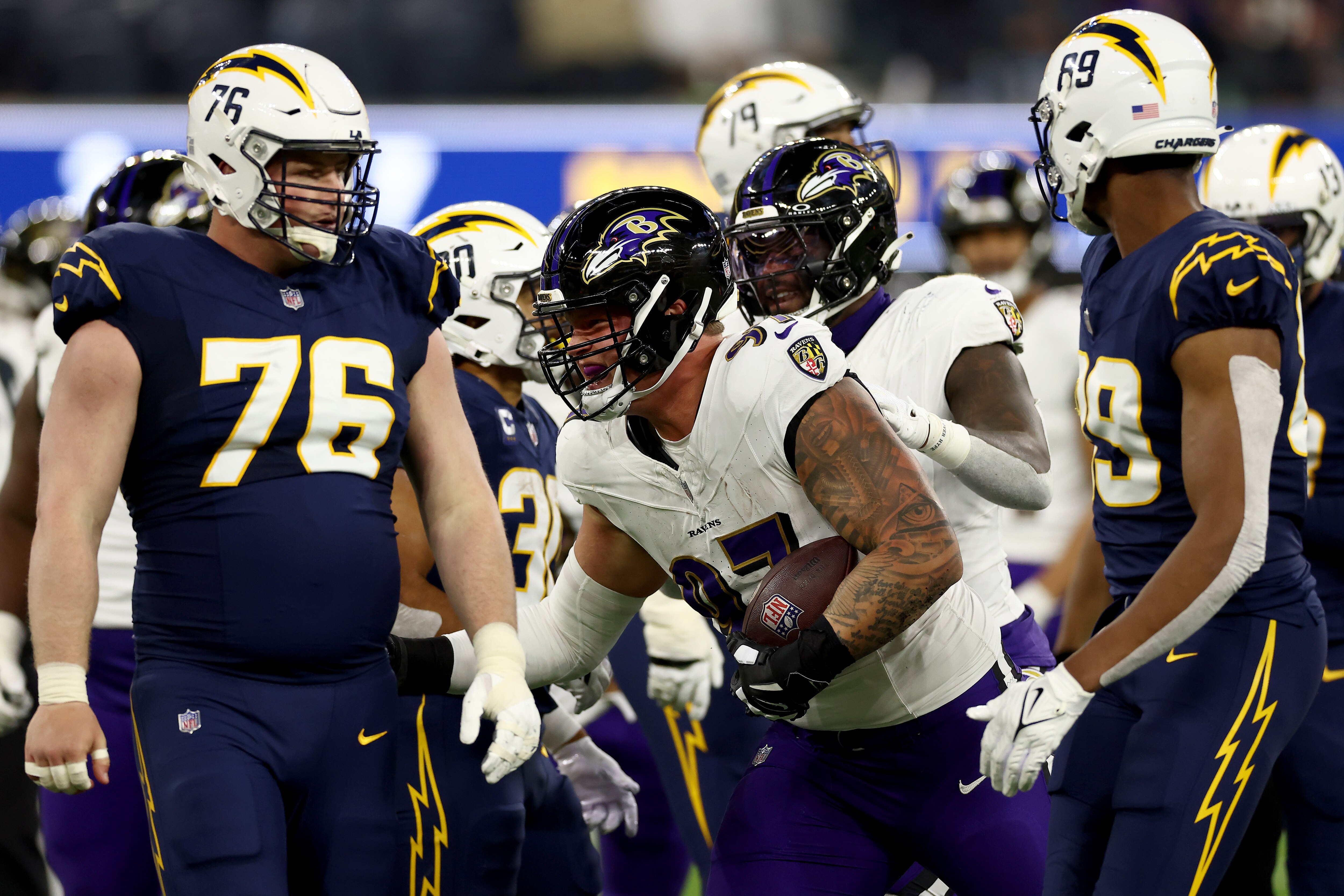 Brent Urban makes one of three Ravens fumble recoveries that made an impact on their 20-10 win at Los Angeles on Sunday night.