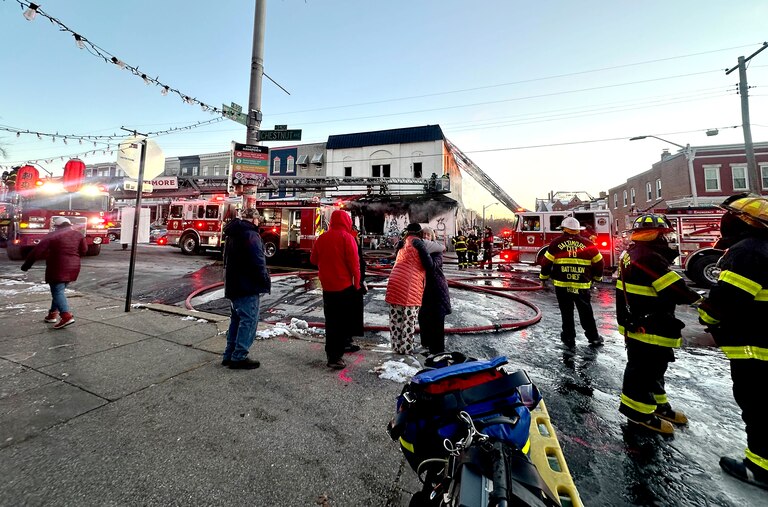 Baltimore City Fire Department crews respond to a blaze at Falkenhan’s Hardware in Hampden on Dec. 15, 2025.
