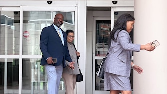 WEDNESDAY, APRIL 15, 2026 - Former Dunbar football coach and city schools police officer Lawrence Smith leaves US District court after being sentenced to a year and a day in federal prison for stealing police overtime pay.