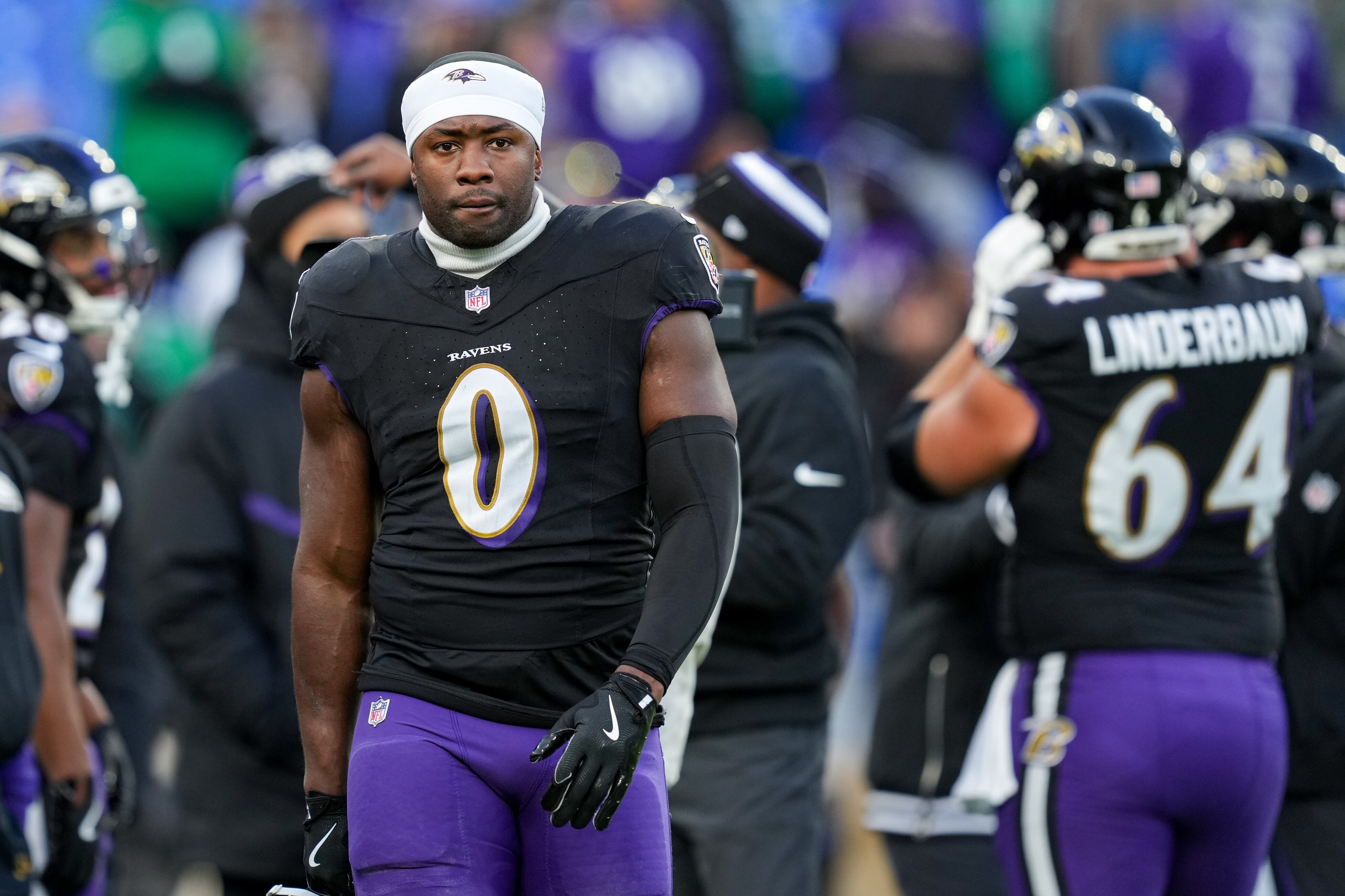 Baltimore Ravens linebacker Roquan Smith (0) on the field with his team before a game against the Philadelphia Eagles at M&T Bank Stadium in Baltimore, Md. on Sunday, December 1, 2024.