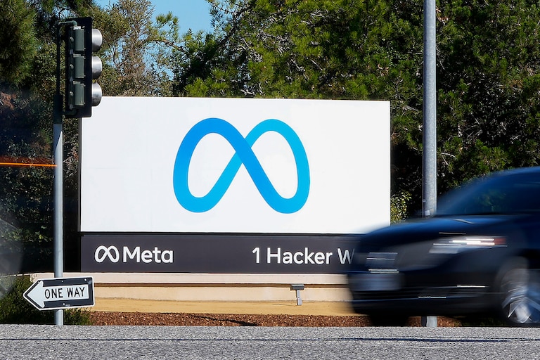 FILE - A car passes Facebook's new Meta logo on a sign at the company headquarters on Oct. 28, 2021, in Menlo Park, Calif. For the first time in a year, the big companies in the S&P 500 may be seeing their profits grow again. The company has been focusing on keeping costs lower, and Wall Street also expects its revenue growth accelerated during the latest quarter.