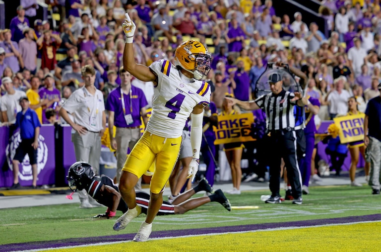 Cornerback Mansoor Delane #4 of the Louisiana State Tigers celebrates a pass defense during the game against the South Carolina Gamecocks at Tiger Stadium on October 11, 2025 in Baton Rouge, Louisiana.
