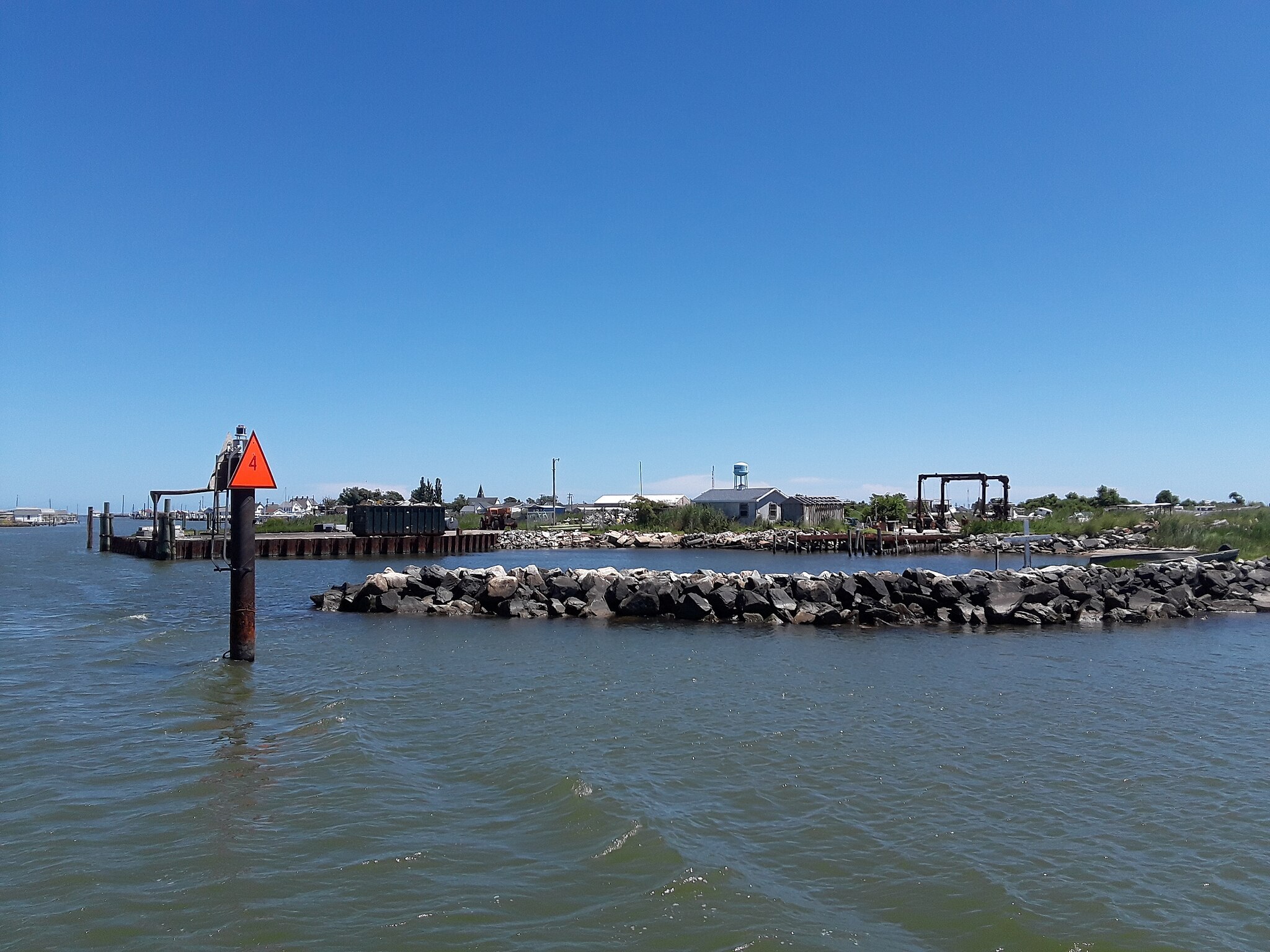 The island community will be able to use the money to shore up its petroleum storage and make other necessary improvements to protect from flooding.