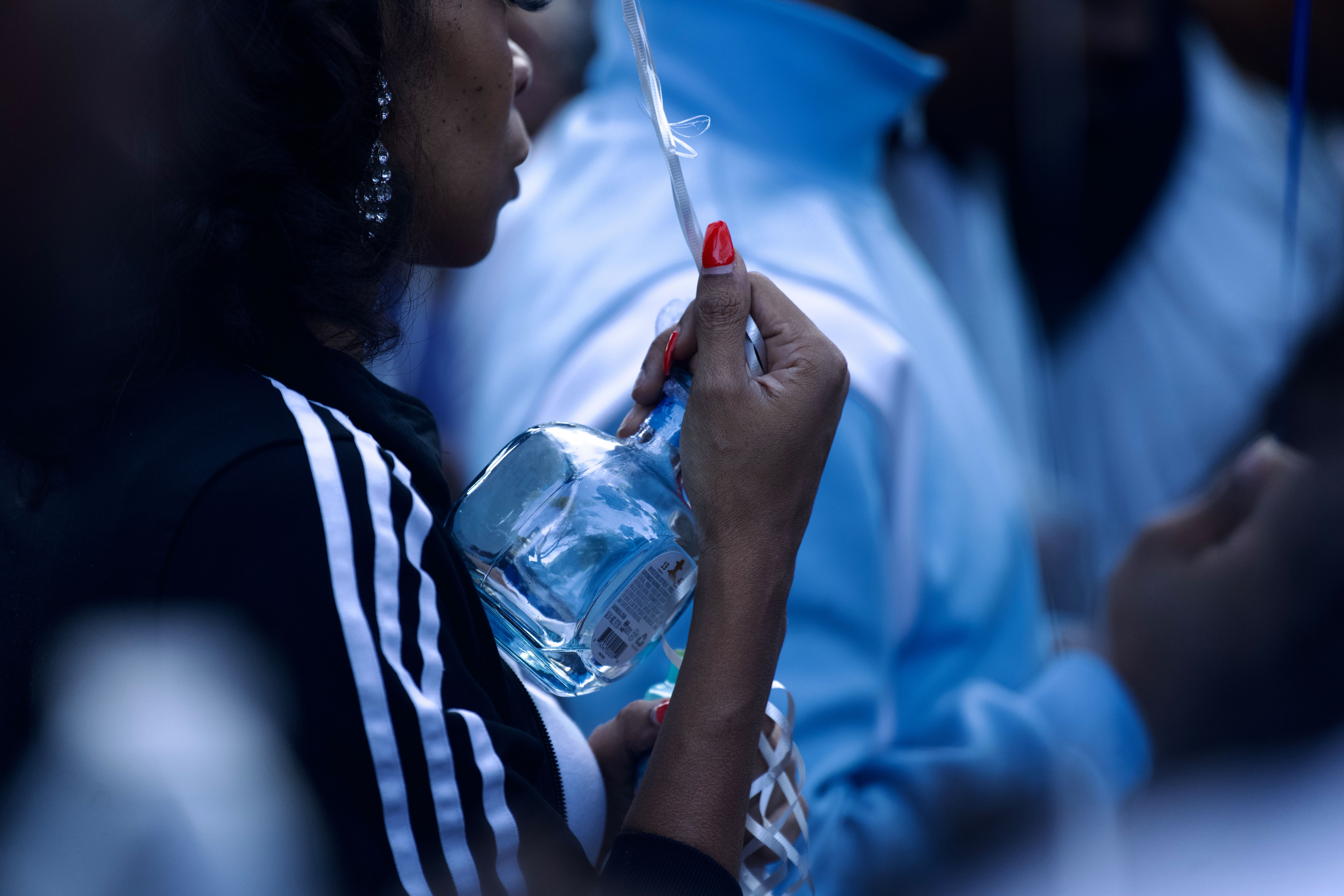 Upwards of one hundred people gathered on the basketball courts to honor and celebrate the life of Anthony “Chris” Martin including his cousins, brother and fiancé.
