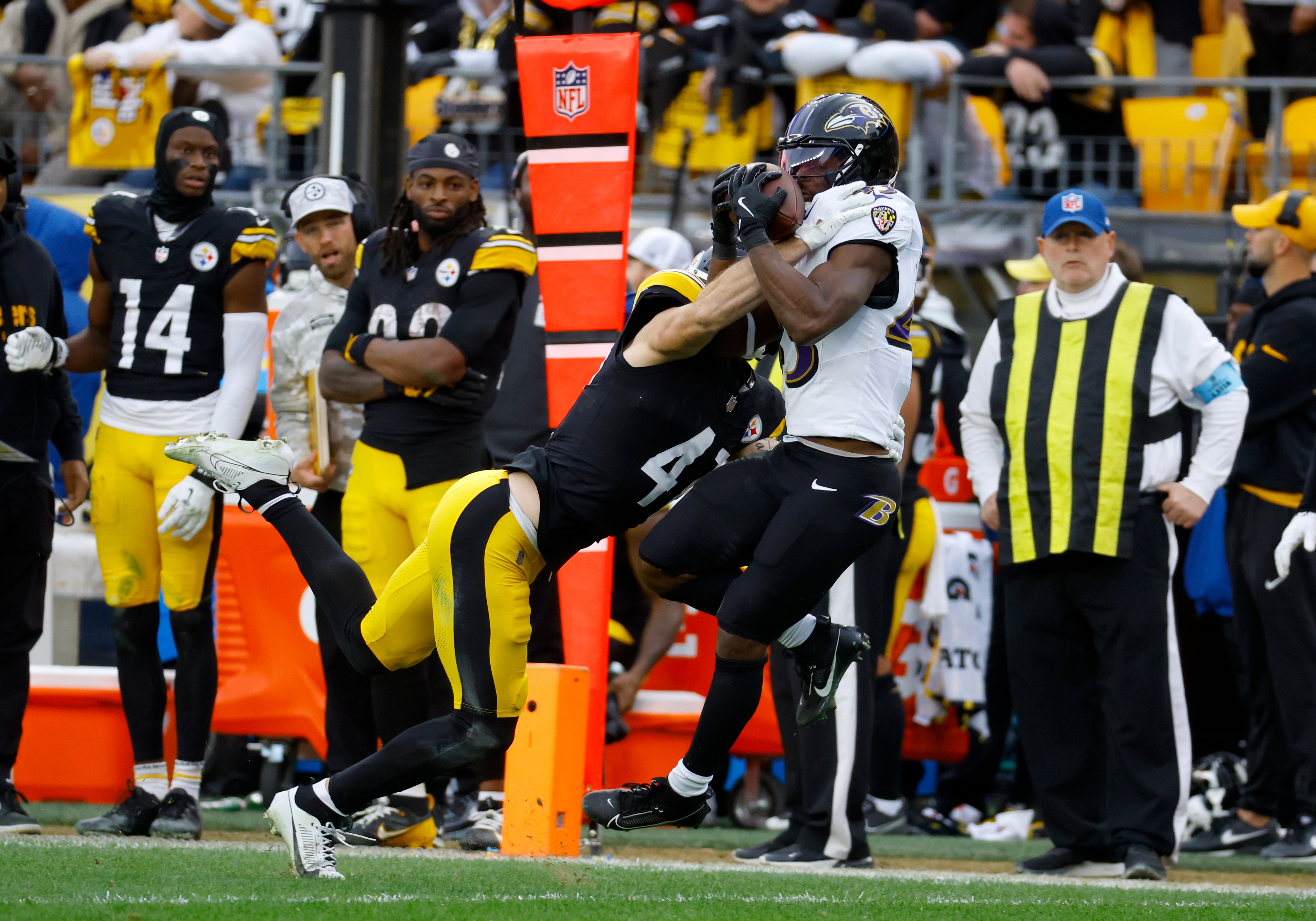 Payton Wilson of the Steelers intercepts a pass intended for Justice Hill in the fourth quarter.