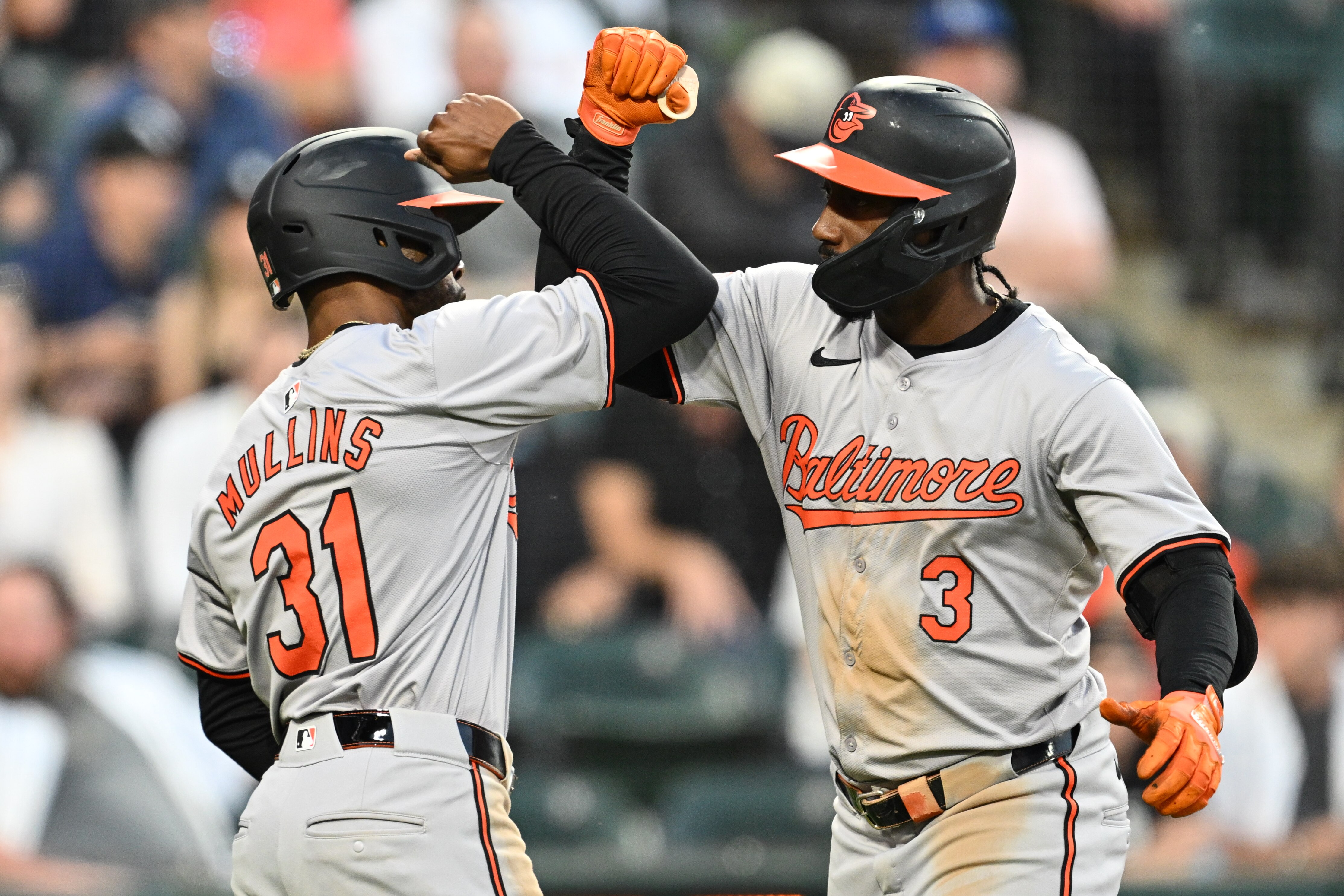 Jorge Mateo (right) receives a greeting from Cedric Mullins after hitting a go-ahead three-run home run in the fourth inning Thursday night as the Orioles beat the White Sox 8-6.