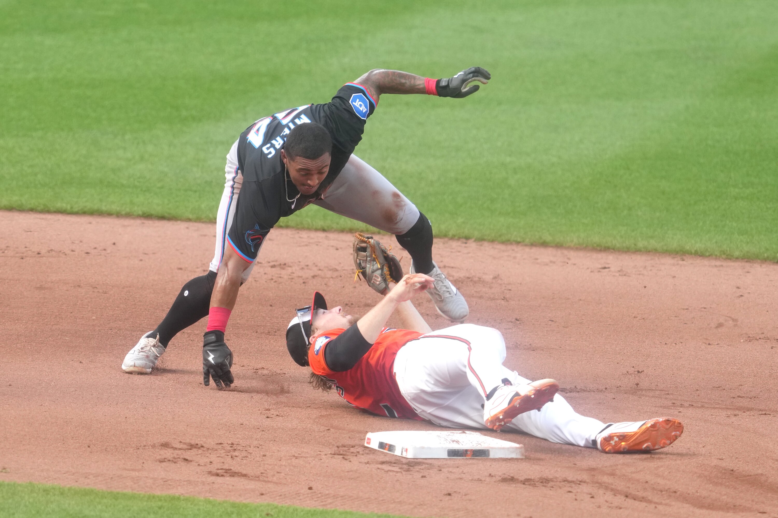 Orioles shortstop Gunnar Henderson tags out Dane Myers of the Marlins trying to steal in the fifth inning.