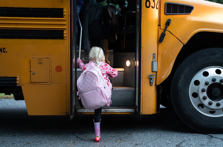 MONDAY, OCTOBER 13, 2025 — Ava Funk, 5, boards her school bus to Davidsonville Elementary School in Riva, MD.