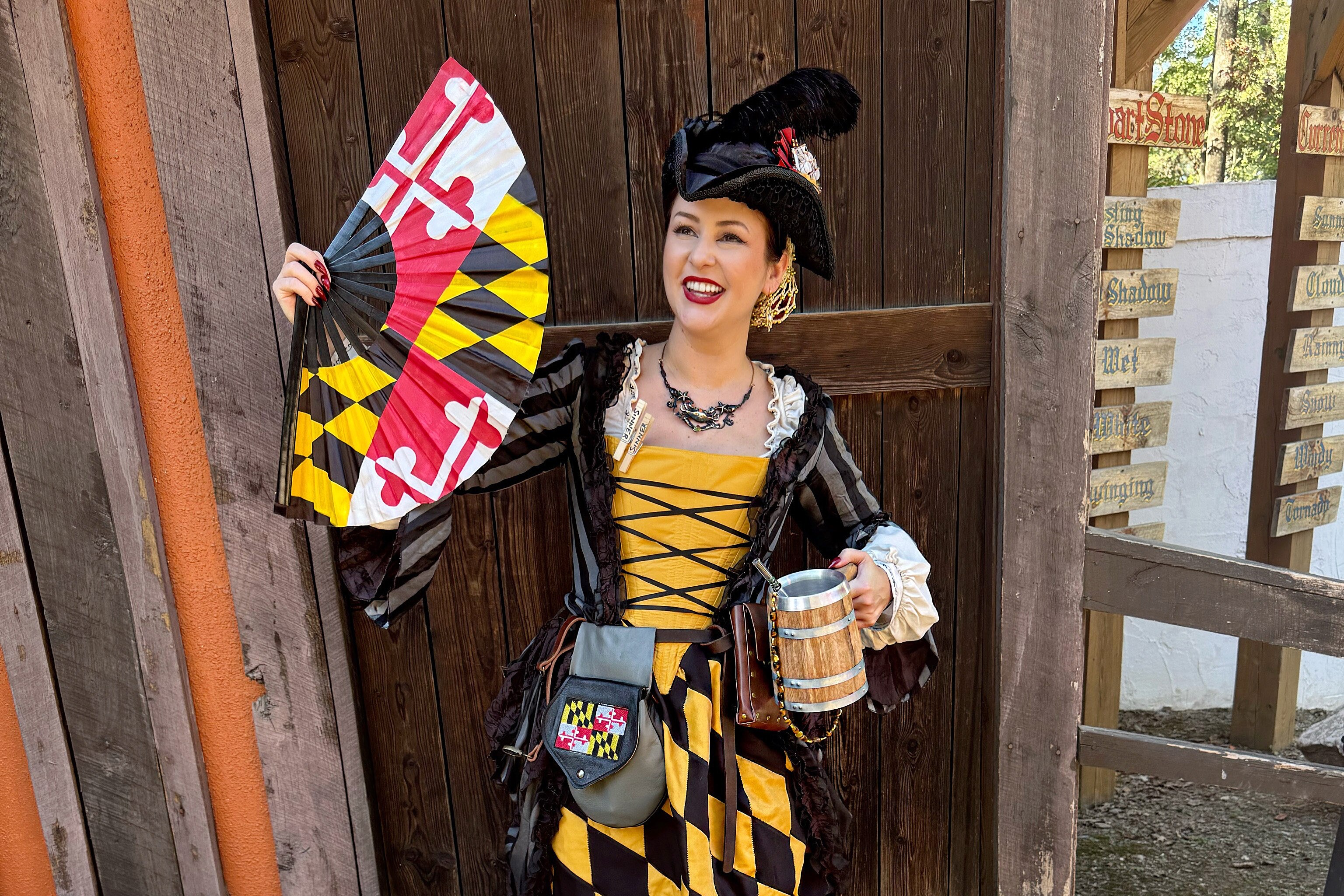 Natalie Hanrion dressed up as a pirate in 2025 to match the festival’s theme, but she still used the Maryland flag’s colors and had a matching fan.