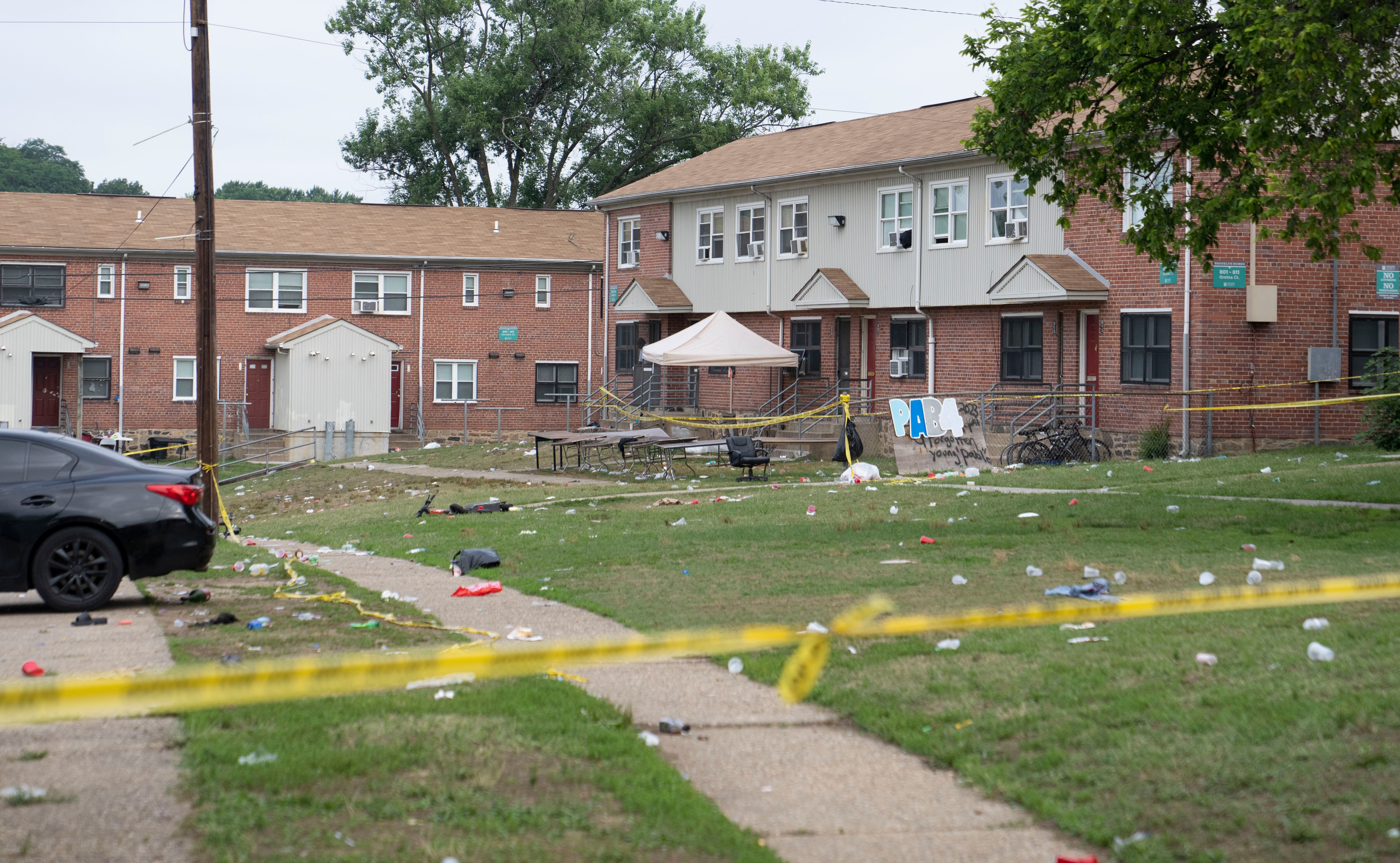 Police tape marks off Glade Court in Brooklyn after the shooting that resulted in two deaths and dozens of injuries.