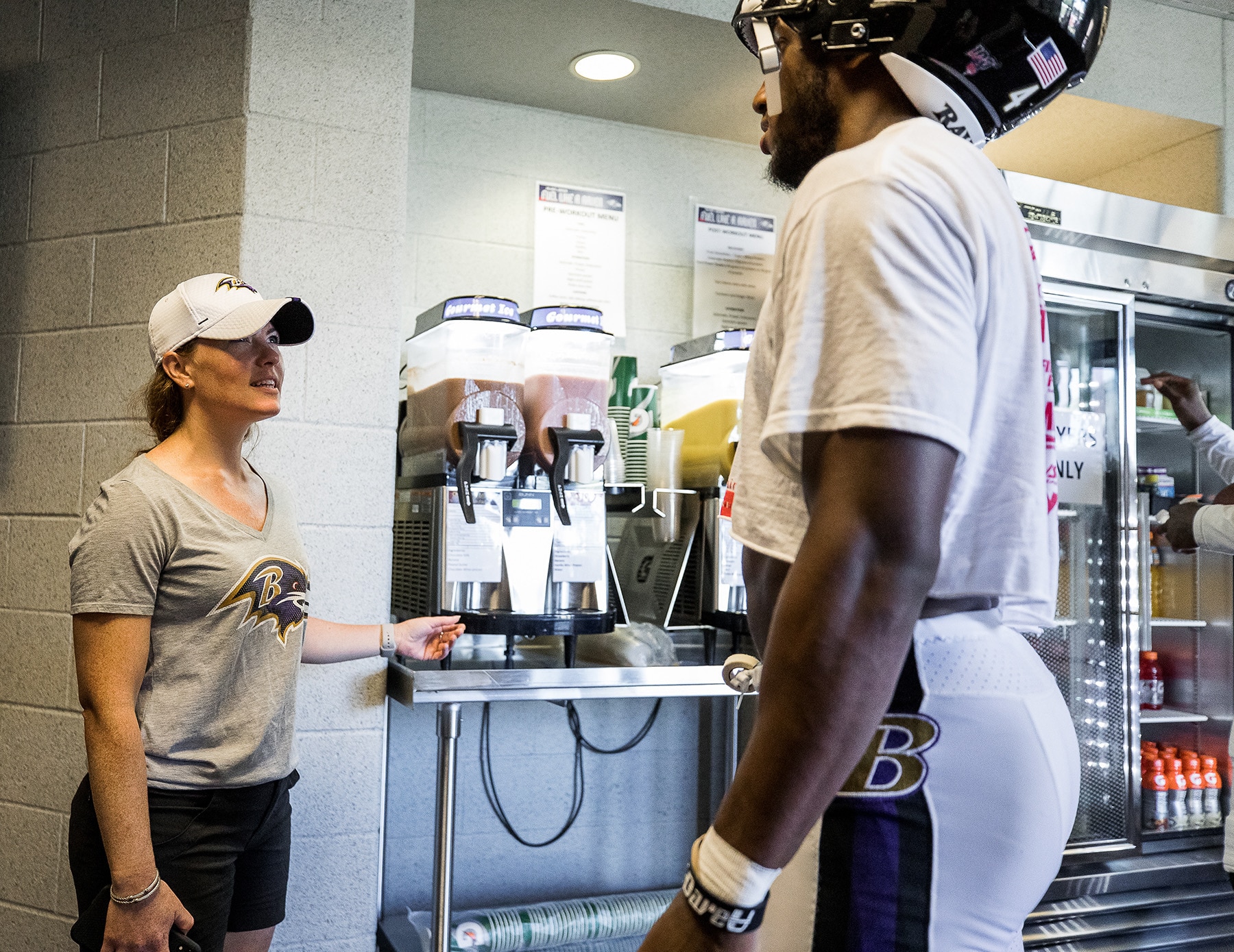 Sarah Snyder consults with Ravens players on their dietary needs through the day. (Photo courtesy of Shawn Hubbard/Baltimore Ravens)