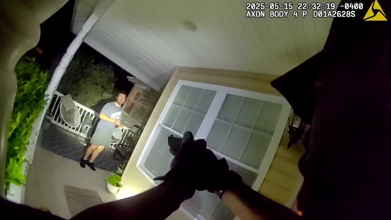 A still from body camera footage of Baltimore County Police officers shooting John Haley during a mental health incident in front of his home.