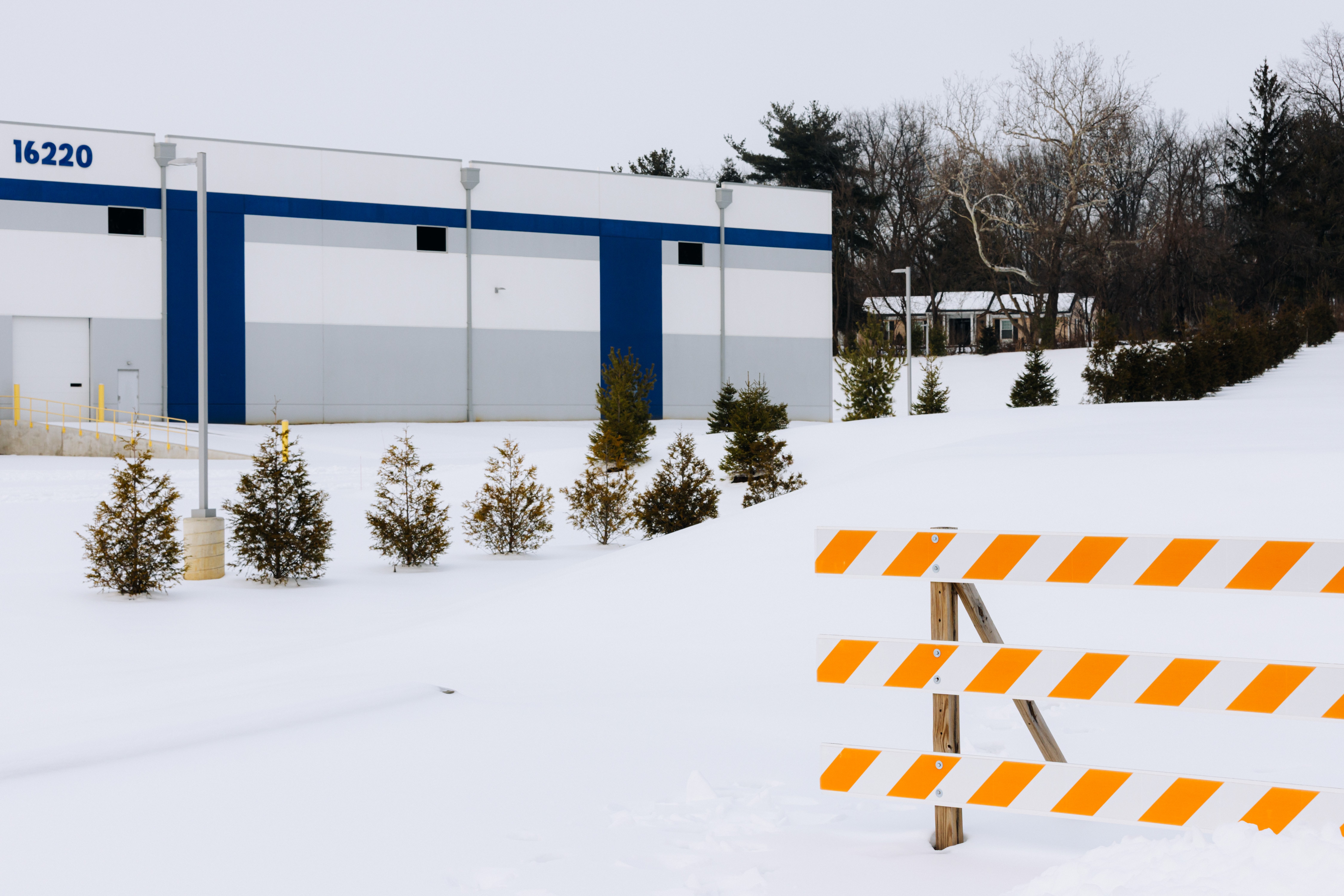 A newly purchased ICE detention facility sits among rolling farmland and recent snow in Williamsport.