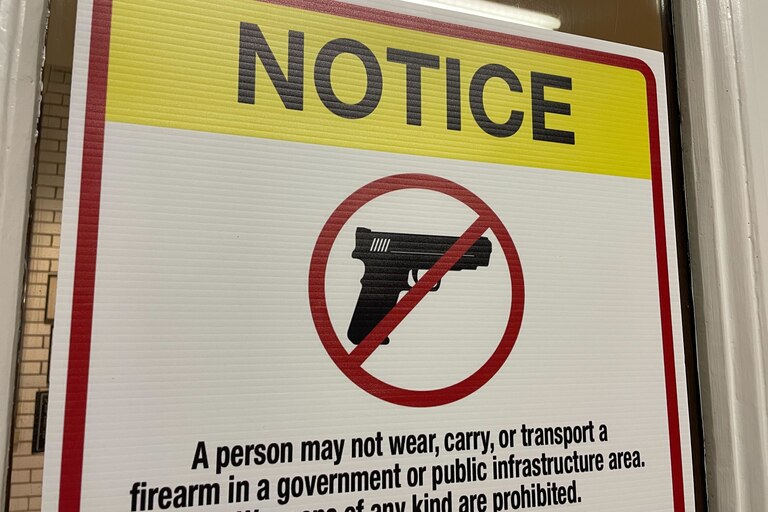 A sign at the State House in Annapolis warns that guns are not allowed to be carried inside. State lawmakers restricted where people can carry concealed handguns during the 2023 General Assembly session; the law is being challenged in court. The sign is pictured on Wednesday, Nov. 8, 2023.