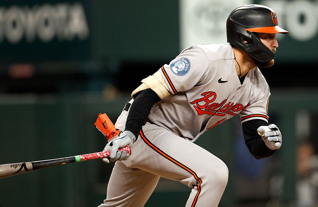 Colton Cowser singles against the Texas Rangers during the fifth inning on Aug. 7.