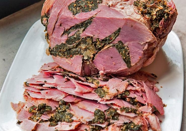 Stuffed ham, which is packed with greens and spices, is a St. Mary's County tradition.