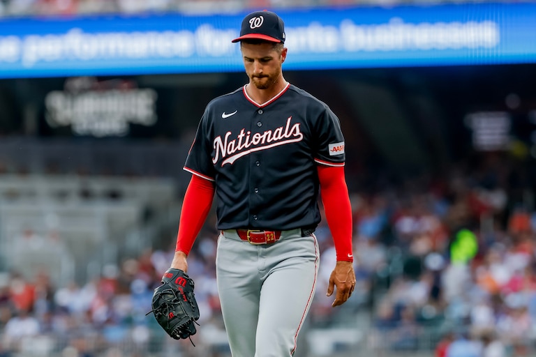 Washington Nationals pitcher Foster Griffin walks back to the dugout after giving up a run to the Atlanta Braves during the first inning of a baseball game, Friday, July 31, 2026, in Atlanta. (AP Photo/Erik S. Lesser)
