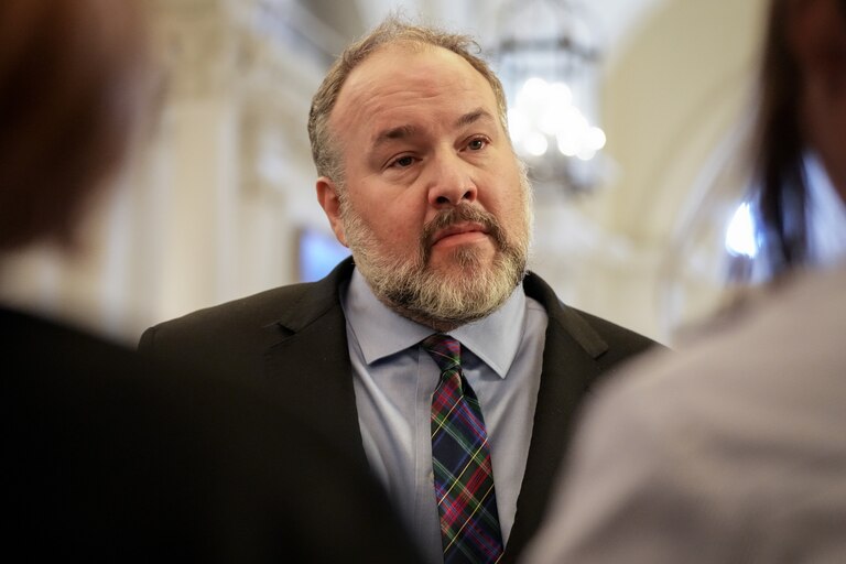 Del. Luke Clippinger, chairman of the House Judiciary Committee, speaks with reporters following a news conference announcing new juvenile justice legislation in the Maryland State House lobby on January 31, 2024.