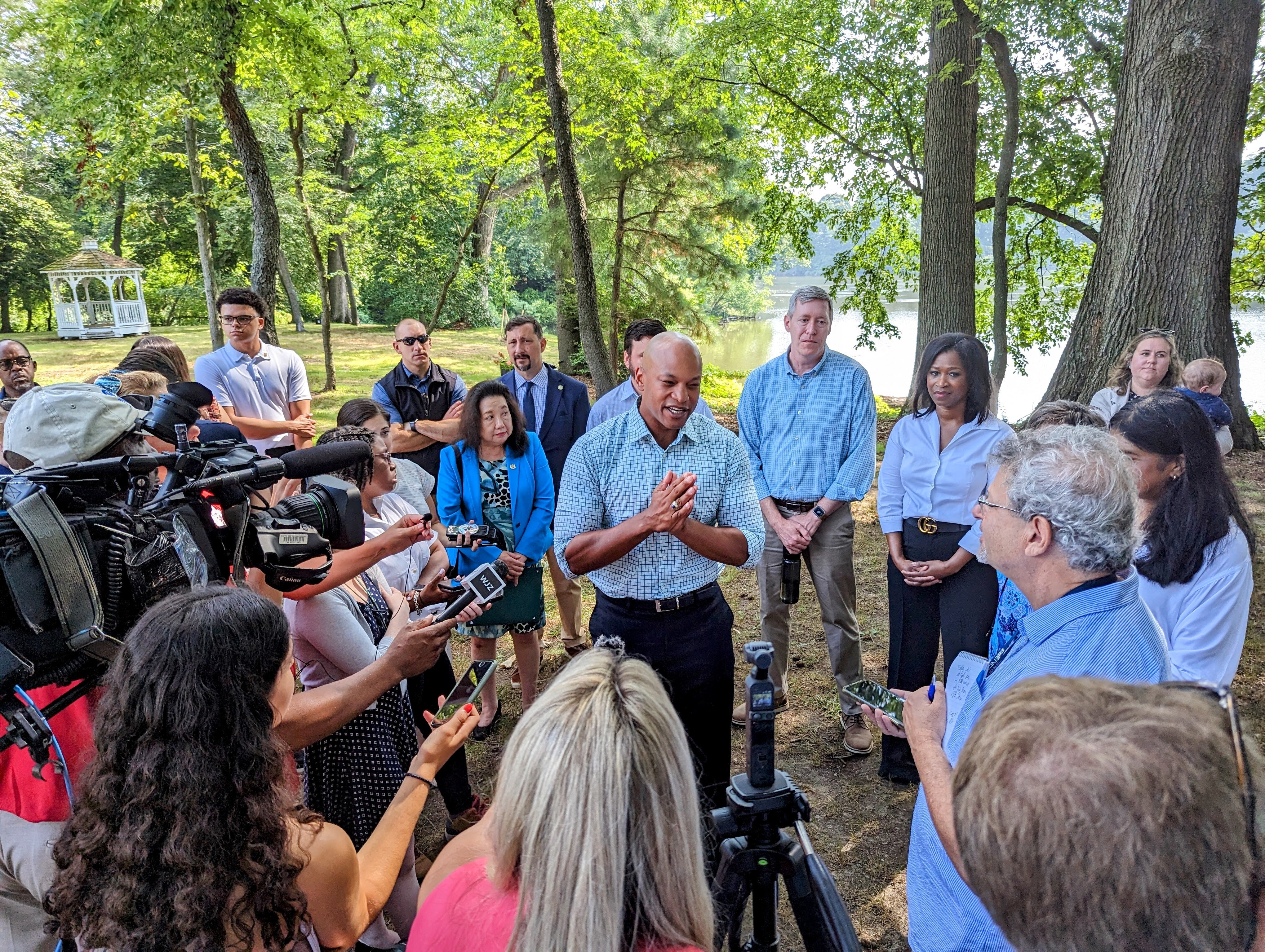 Surrounded by members of his cabinet, Gov. Wes Moore talks to reporters at Wye Island Natural Resources Management Area on Thursday, July 20, 2023 after announcing a change in state policy on Chesapeake Bay Clean up.